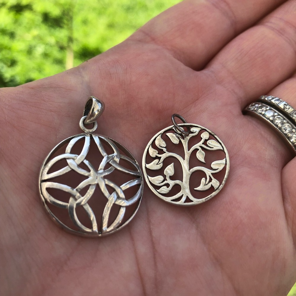 Lot of two sterling silver pendants